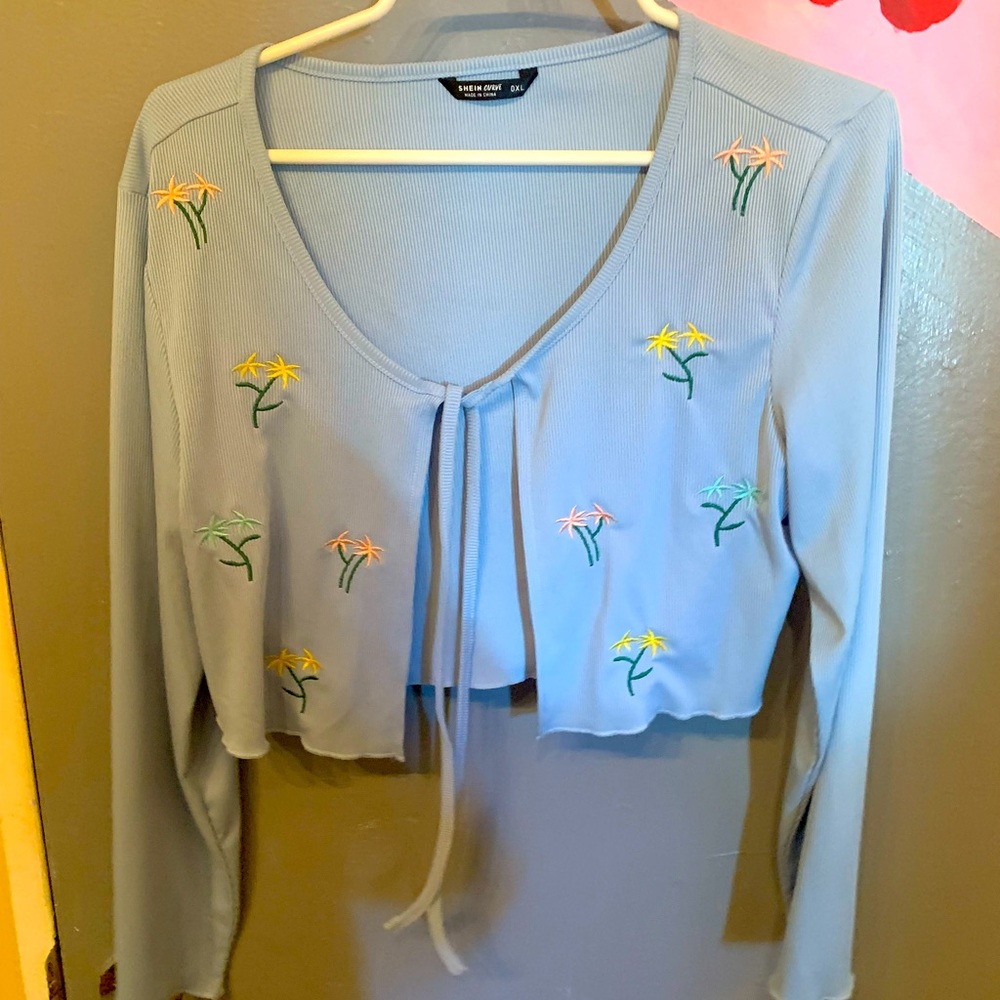 light blue with flowers tie shirt